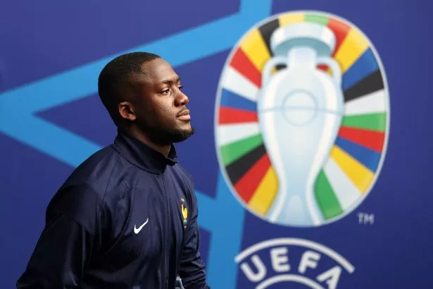 Ibrahima Konate of France walks out of the tunnel to inspect the pitch prior to the UEFA EURO 2024 quarter-final match between Portugal and France at Volksparkstadion on July 05, 2024 in Hamburg, Germany