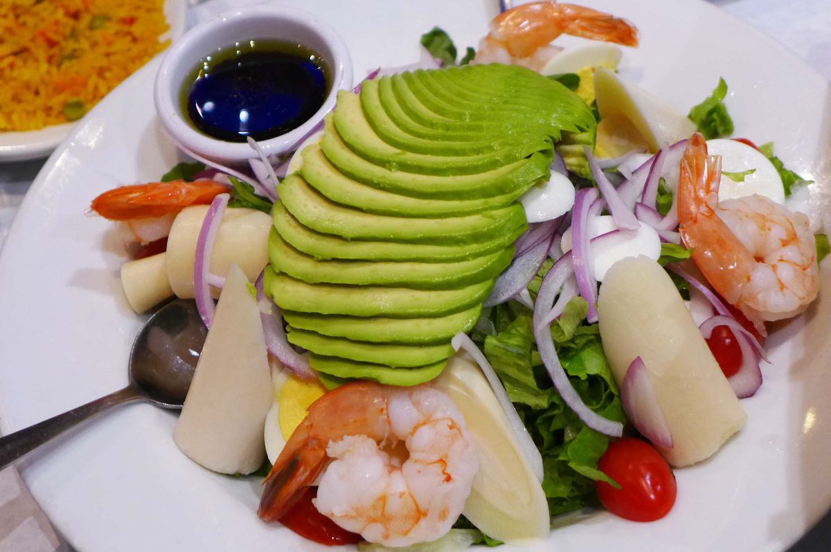 A large bowl of salad as described.