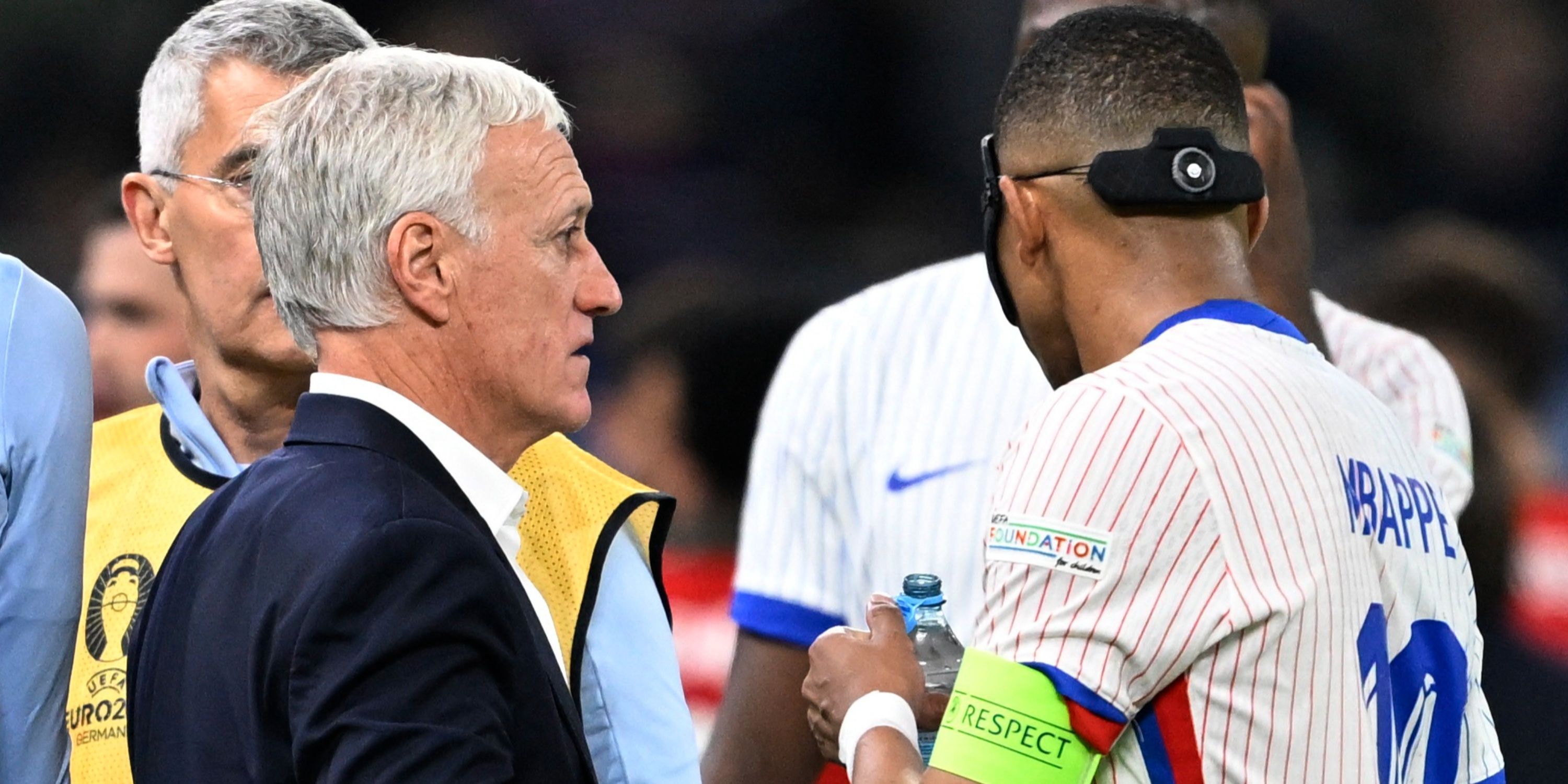 France's Kylian Mbappe with coach Didier Deschamps