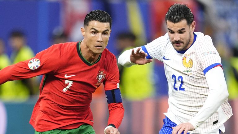 Cristiano Ronaldo takes on Theo Hernandez